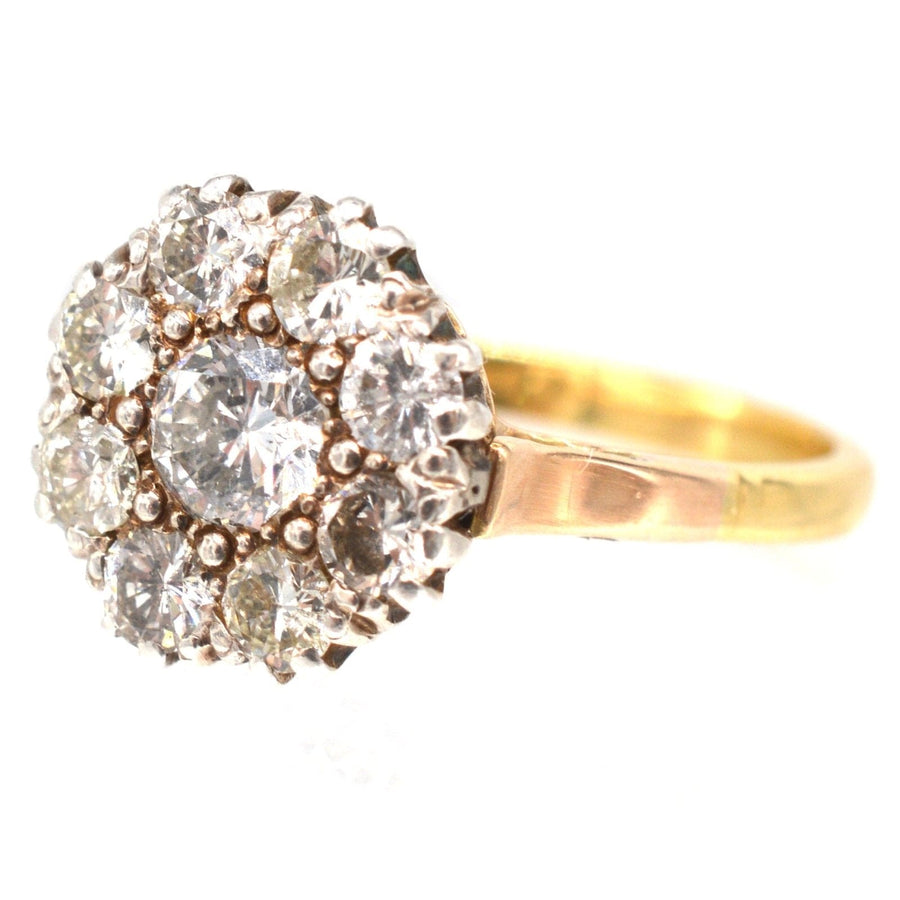 Retro 18ct gold diamond cluster ring with 1.1 carats of bright and white diamonds, certified by WGI.