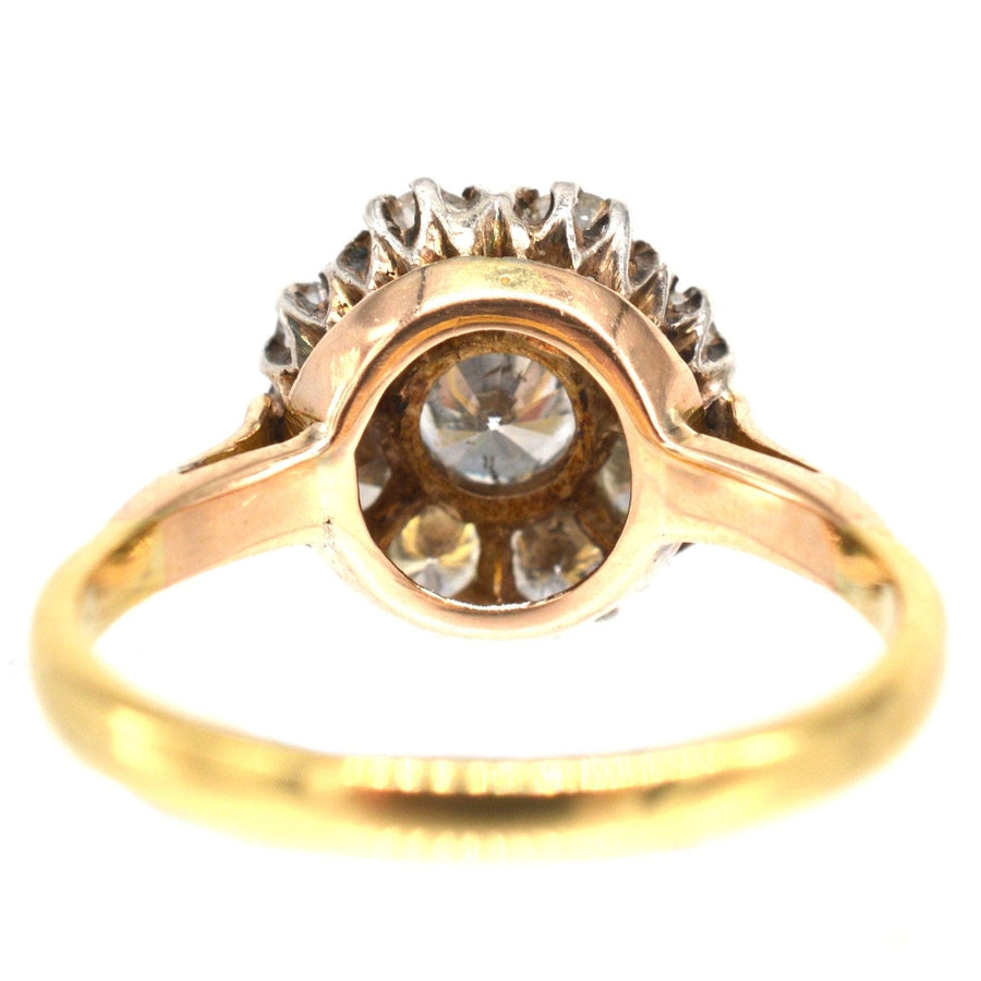 Retro 18ct gold ring featuring a 1.1 carat diamond cluster, certified by World Gemological Institute for engagement or vintage jewelry.