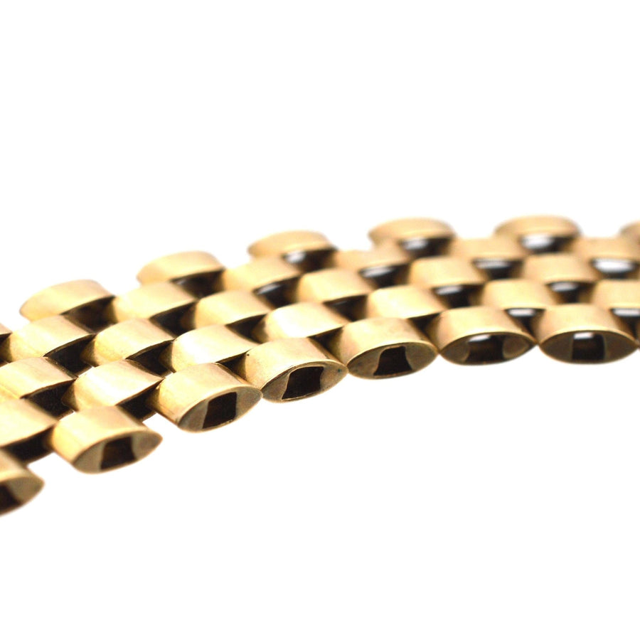 Close-up of a retro 1940s 9ct gold tank bracelet showcasing its elegant design and craftsmanship.