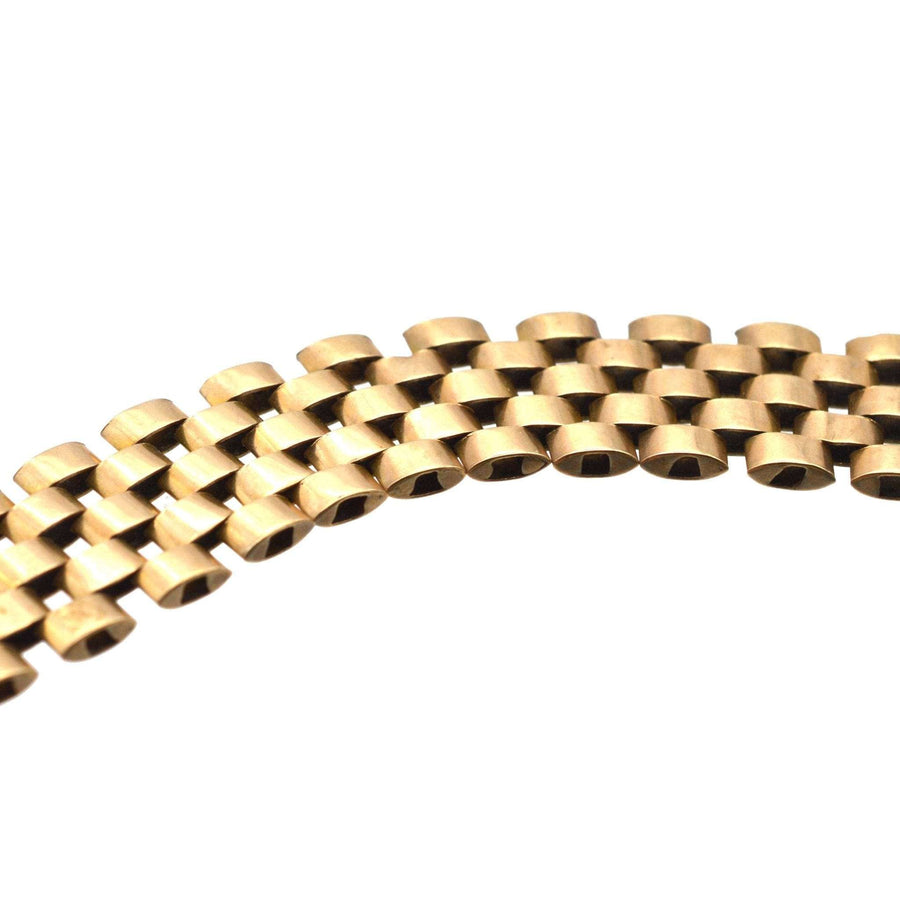 Close-up of a retro 1940s 9ct gold tank bracelet showcasing its elegant design and craftsmanship.