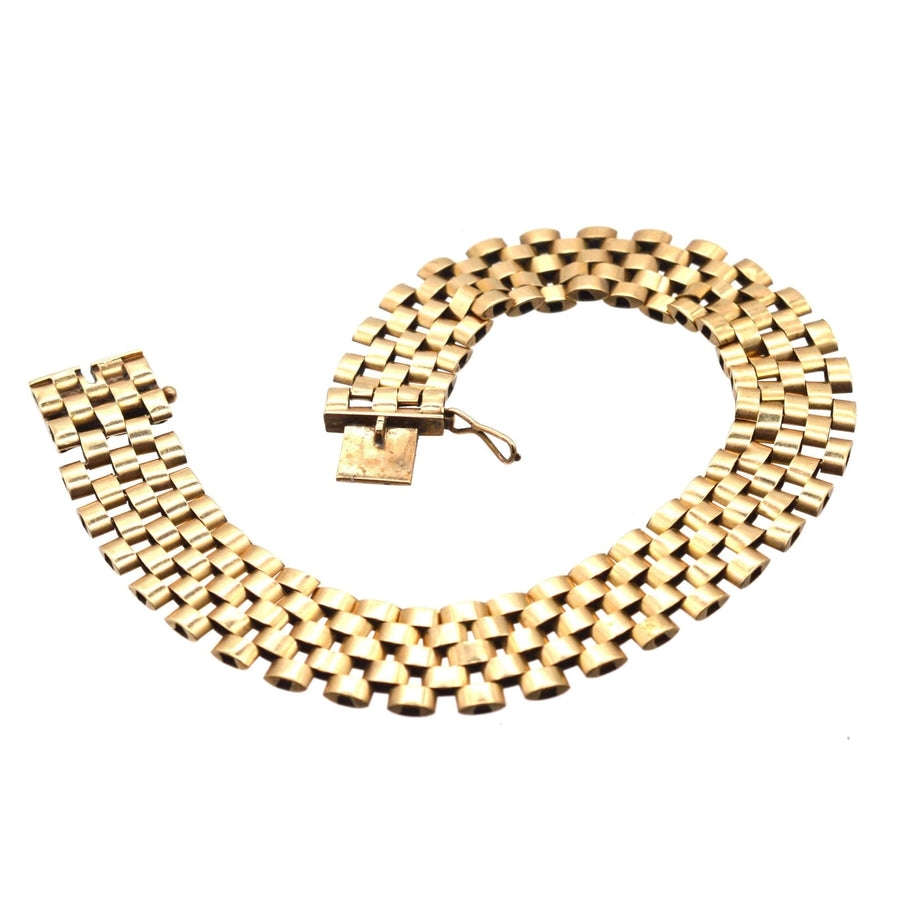 Retro 1940s 9ct gold tank bracelet inspired by Cartier's iconic design, showcasing timeless elegance.