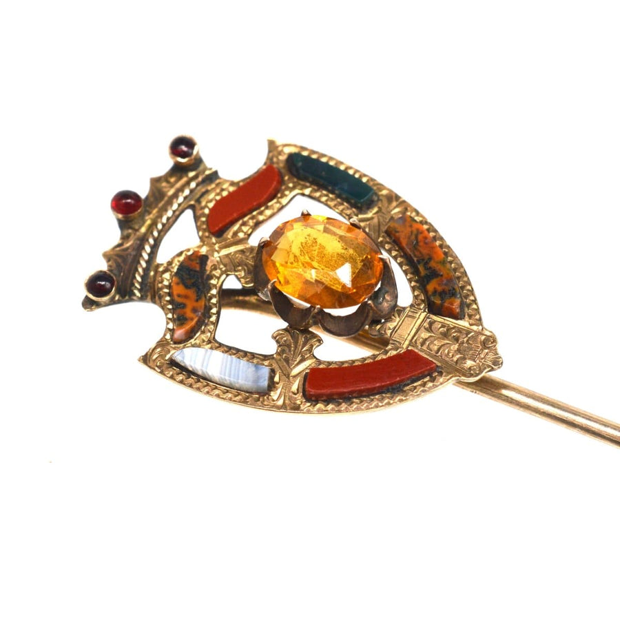 Scottish 9ct gold Luckenbooth shield tie pin featuring Cairngorm Citrine and colorful enamel detailing.