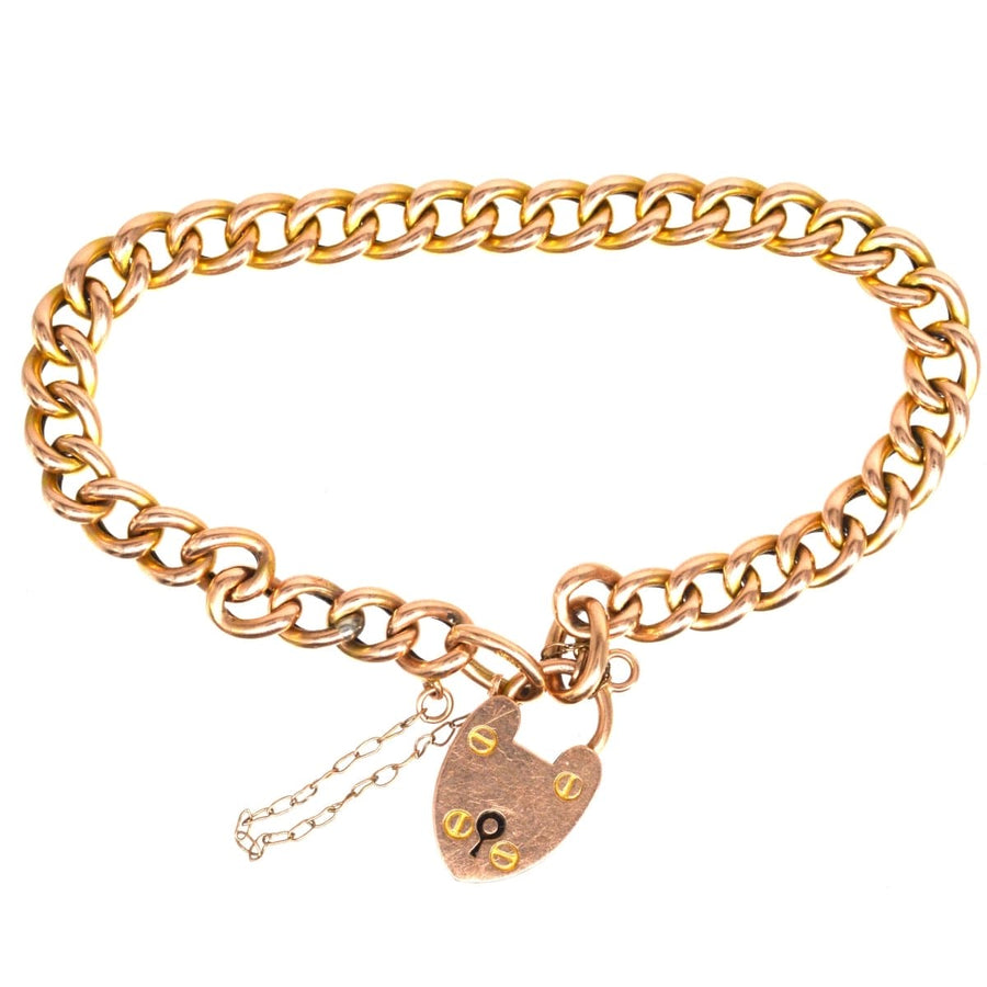 Small Edwardian 15ct gold curb bracelet with heart lock, circa 1900, perfect for a slender wrist.