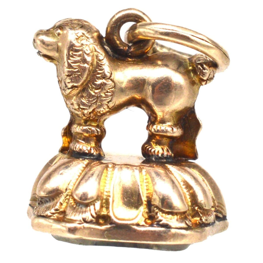 Small Georgian gold cased poodle pendant with rock crystal seal, elegant and antique dog charm.