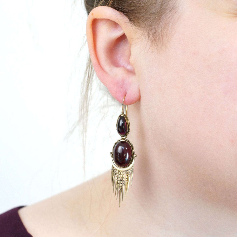Victorian gold cabochon garnet drop earrings with fringe, showcasing intricate design and vintage charm.