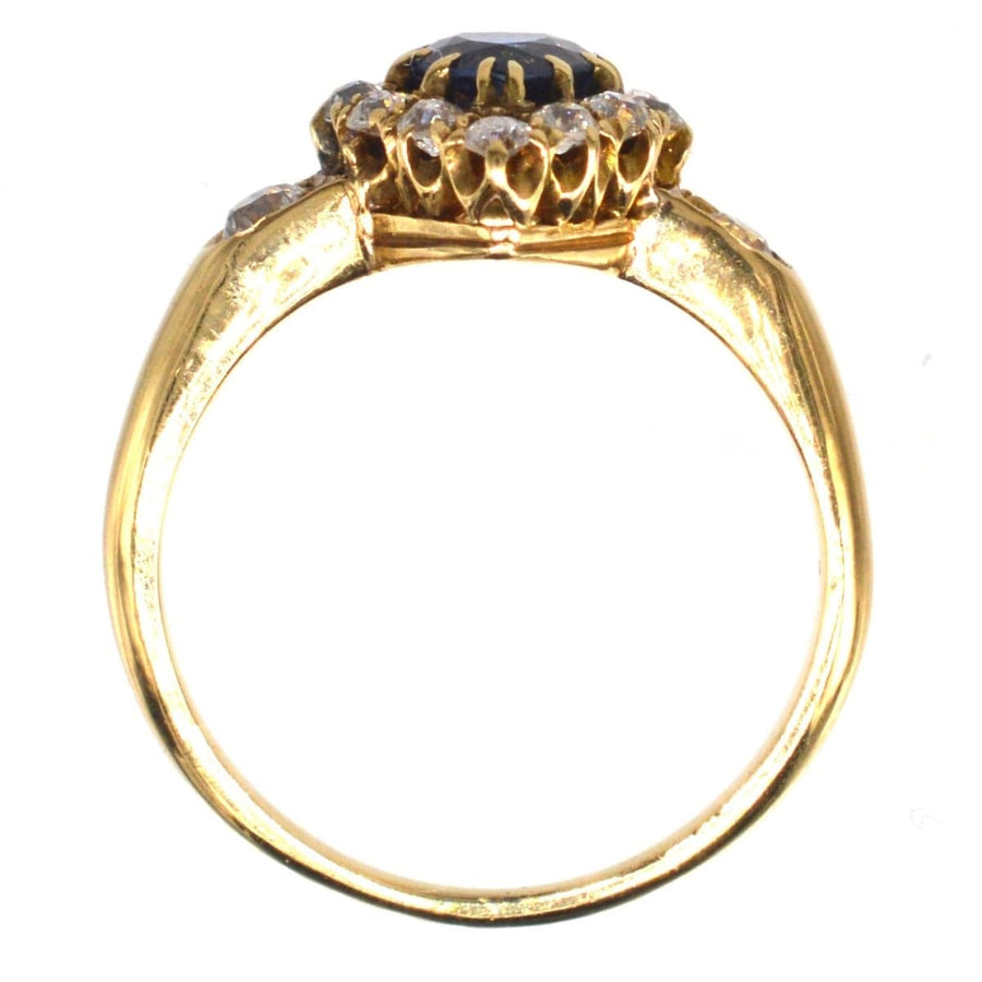 Victorian 18ct gold heart-shaped sapphire and diamond cluster ring showcasing exquisite craftsmanship.