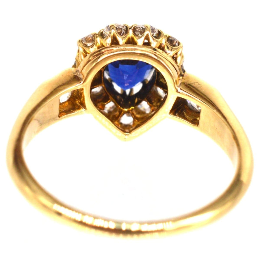 Victorian 18ct gold heart-shaped sapphire and diamond cluster ring showcasing exquisite craftsmanship.