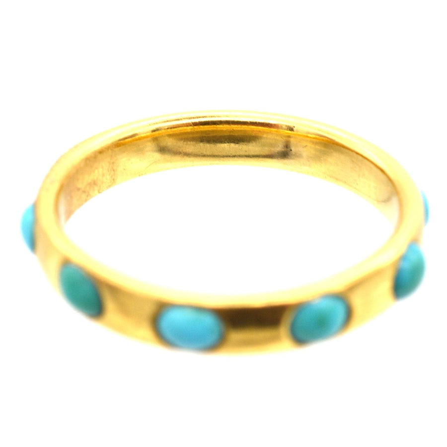 Victorian 18ct gold eternity ring with turquoise stones, symbolizing love and perfect for stacking or gifting.