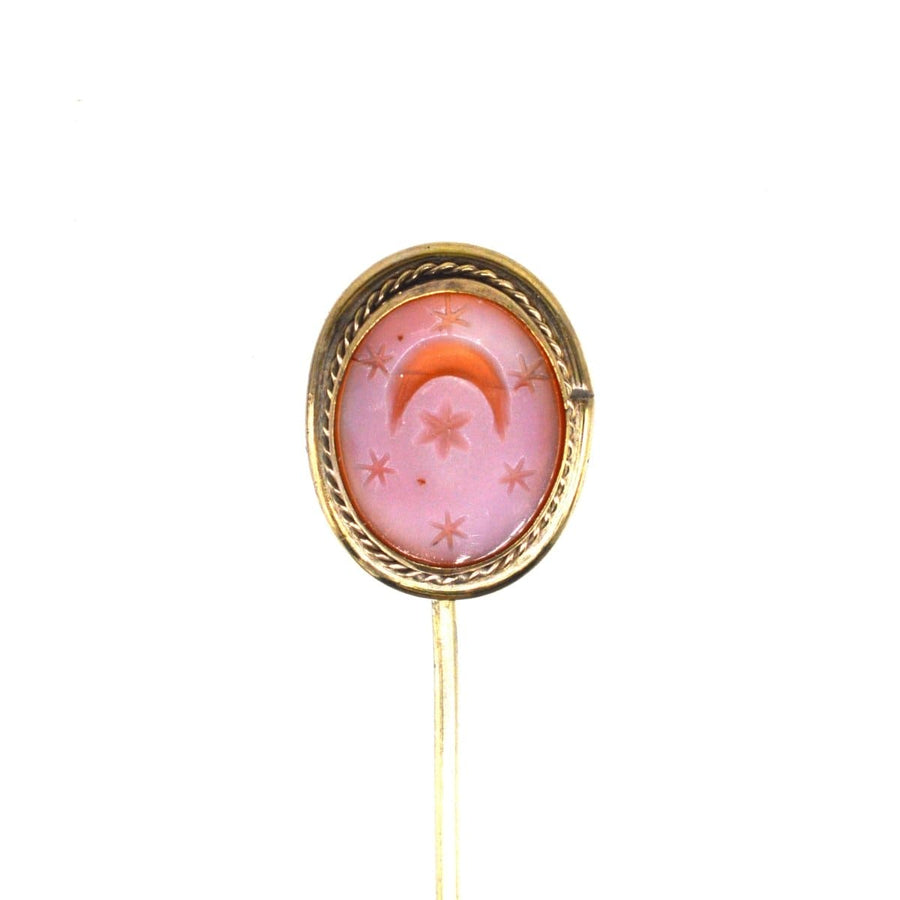 Victorian 9ct gold carnelian tie pin featuring a crescent moon and stars, a symbol of new beginnings.