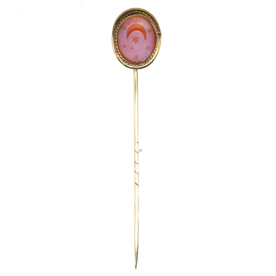 Victorian 9ct gold carnelian tie pin featuring crescent moon and stars, symbolizing new beginnings.