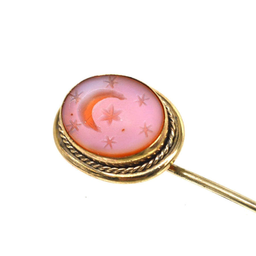 Victorian 9ct Gold Carnelian Tie Pin featuring an ornate crescent moon and stars design, symbolizing new beginnings.