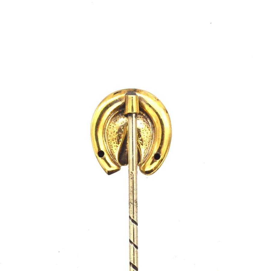 Victorian 9ct gold horseshoe tie pin symbolizing good luck and protection, ideal for stylish silk ties.