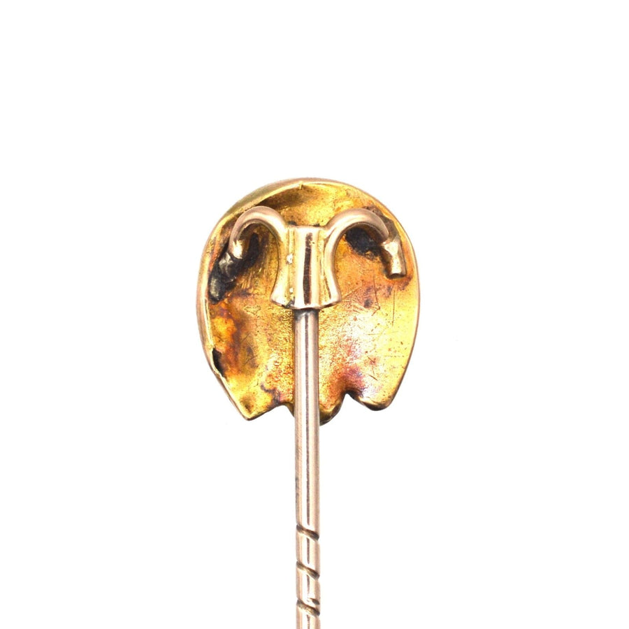 Victorian 9ct gold horseshoe tie pin featuring a vintage design for good luck and protection.