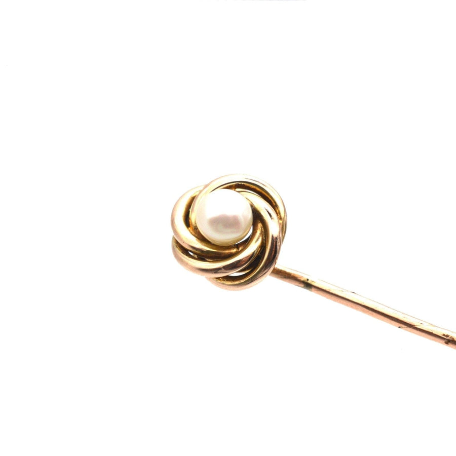 Victorian 9ct gold knot twist tie pin featuring a lustrous pearl centerpiece, elegant and timeless accessory.