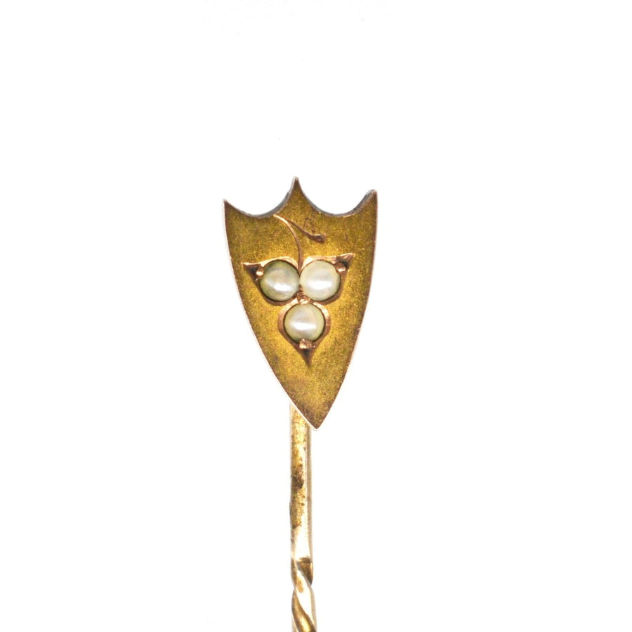 Victorian 9ct gold shield tie pin featuring three split pearls, perfect for adding a classic touch to any outfit.