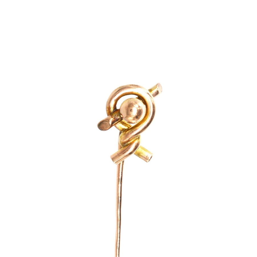 Victorian 9ct gold twist knot tie pin, a stylish accessory symbolizing love with a secure stopper for easy use.