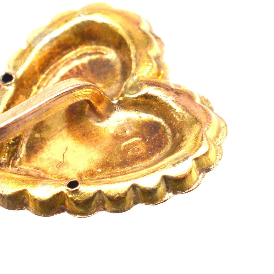 Victorian 9ct gold heart tie pin with intricate rose motif, showcasing two-tone gold craftsmanship from 1898.