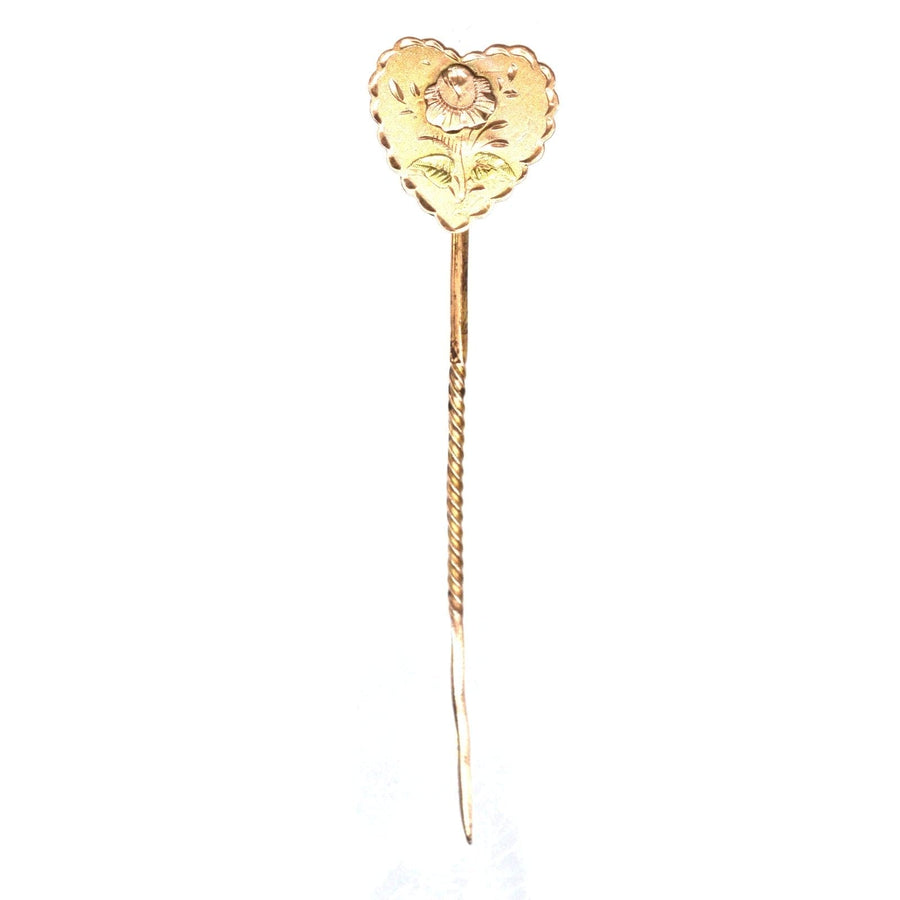 Victorian 9ct gold tie pin with heart and rose motif, showcasing exquisite two-color gold overlay craftsmanship.