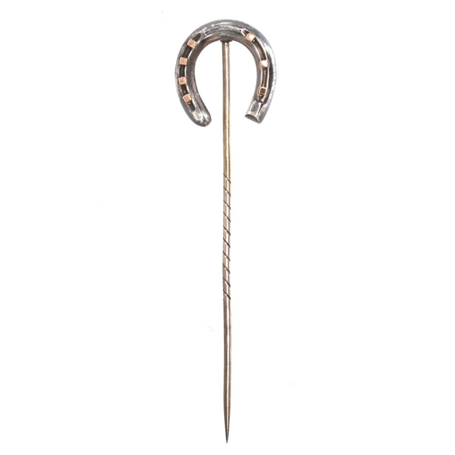 Victorian silver horseshoe tie pin, Birmingham assay 1870, a symbol of luck and protection, ideal for formal wear.