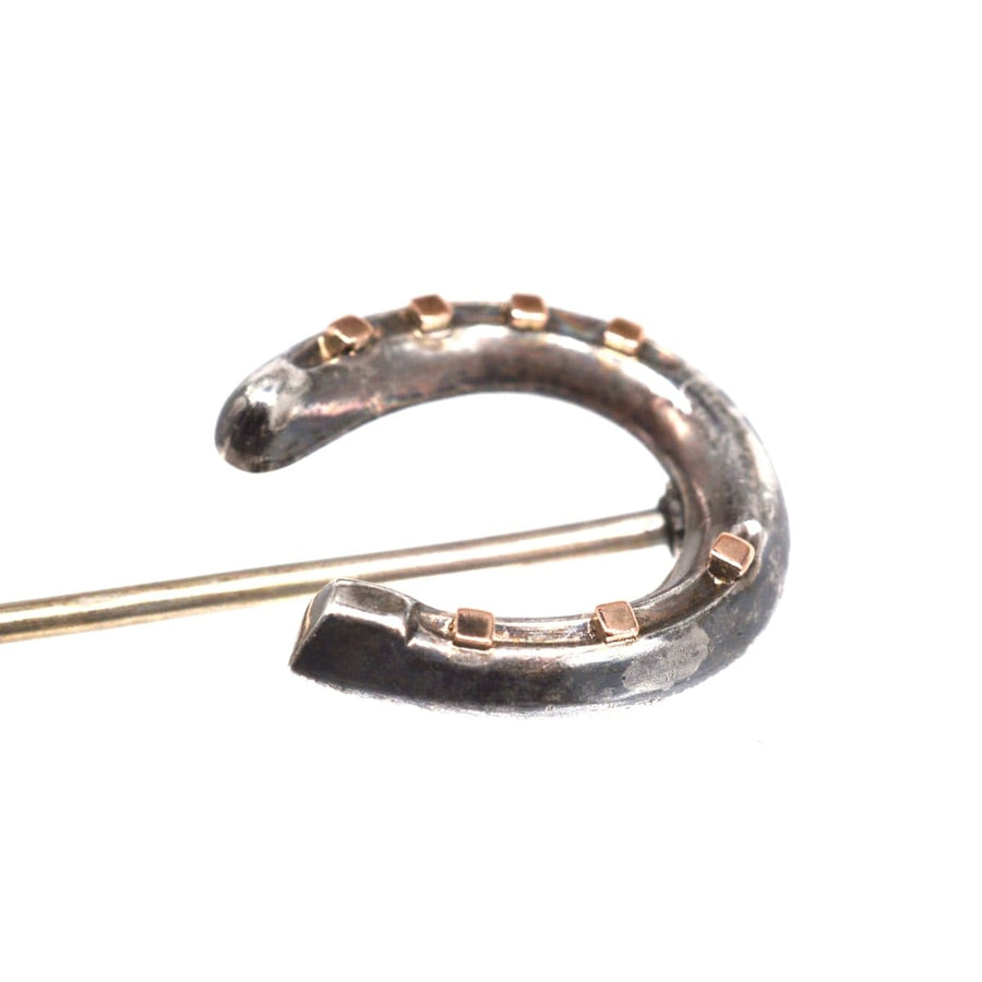 Victorian large silver horseshoe tie pin, symbolizing luck and protection, assayed in Birmingham 1870.