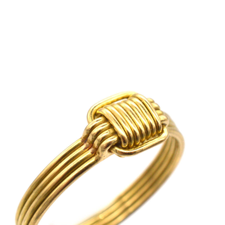 Vintage 1970s 18ct gold elephant hair ring with polished gold wires, showcasing elegant design.