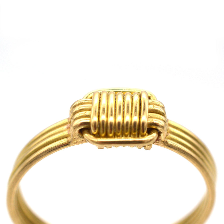 Vintage 1970s 18ct gold elephant hair ring with polished gold wires, showcasing elegance and timeless design.