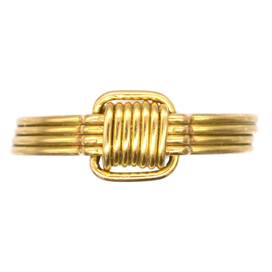 Vintage 1970s 18ct gold elephant hair ring showcasing polished gold wires and elegant design.