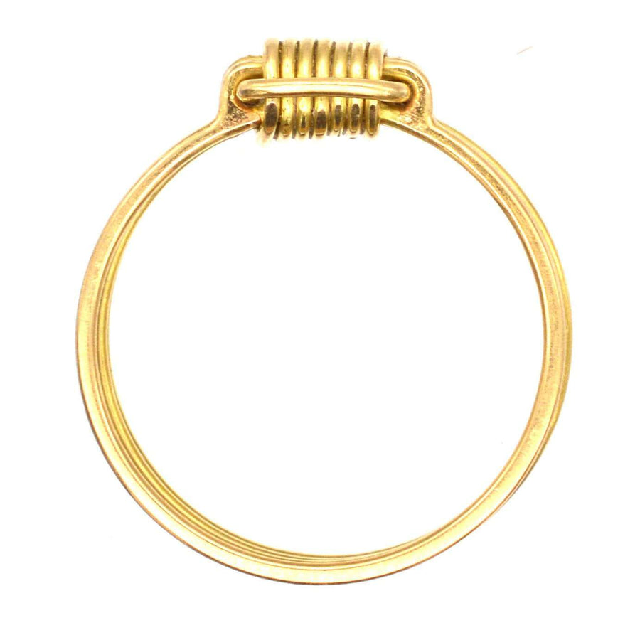 Vintage 1970s 18ct gold elephant hair ring, featuring polished gold wires and a timeless design.