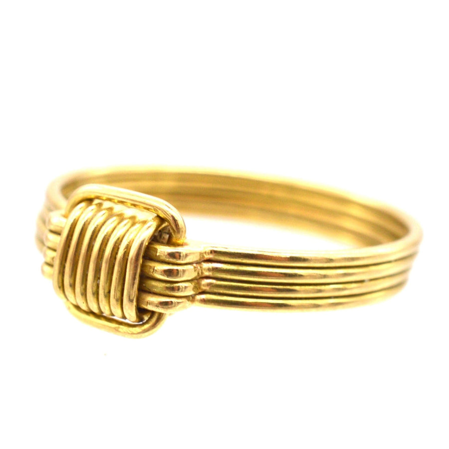 Vintage 1970s 18ct gold elephant hair ring, featuring polished gold wires and elegant design.