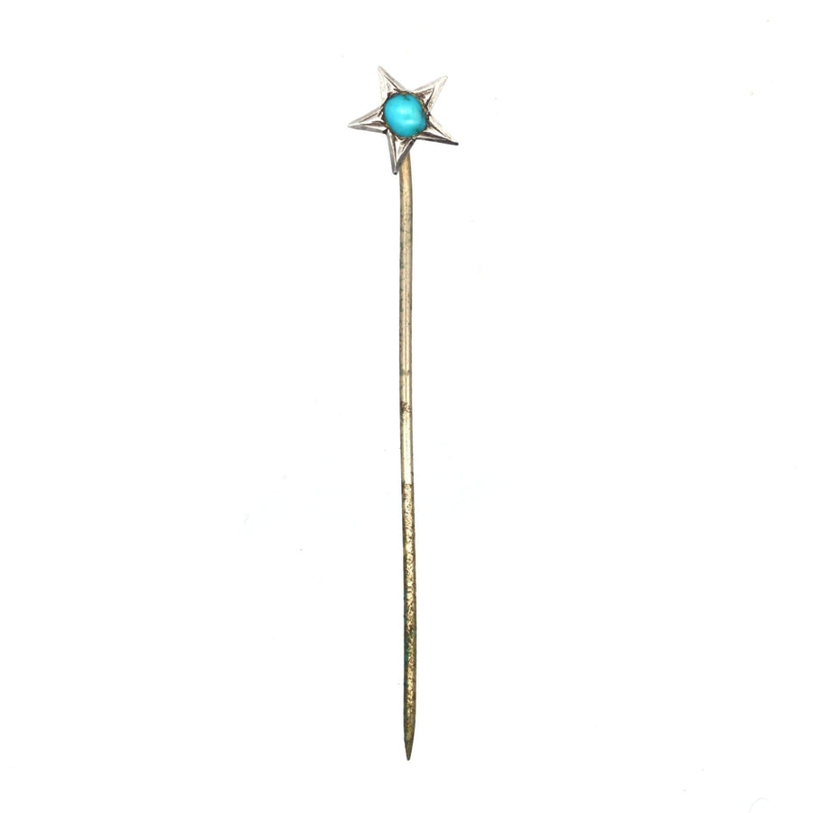 Victorian silver tie pin featuring a star design with a turquoise center, symbolizing love and guidance.