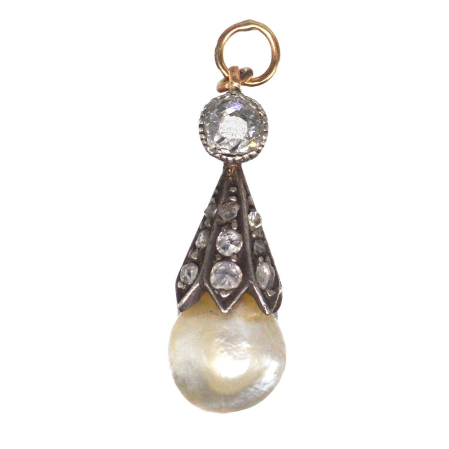 Victorian silver pendant featuring a natural saltwater pearl and diamond accents, perfect for antique jewellery collections.