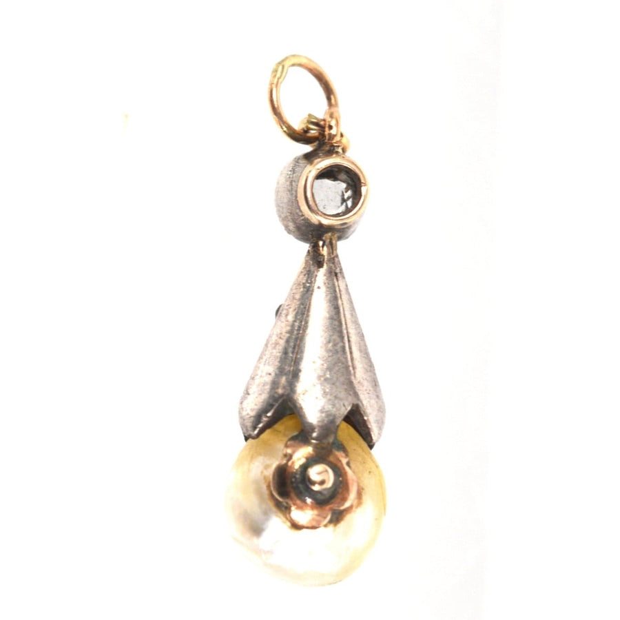 Victorian silver diamond and natural saltwater pearl pendant with an elegant design, perfect for antique jewelry collections.