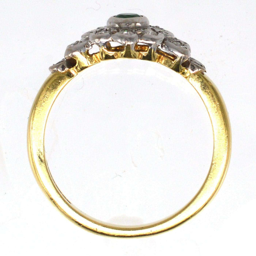 Vintage 18ct gold emerald and diamond cluster ring with sparkling diamond shoulders, ideal for engagement or May birthdays.