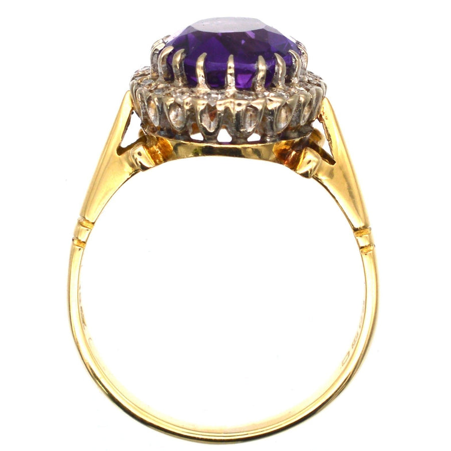 Vintage 1970s 18ct gold ring featuring a royal purple amethyst and diamond cluster.