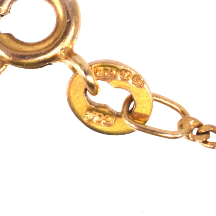 Close-up of the vintage 9ct gold flat curb chain by Cropp & Farr, showcasing the intricate clasp detail and craftsmanship.