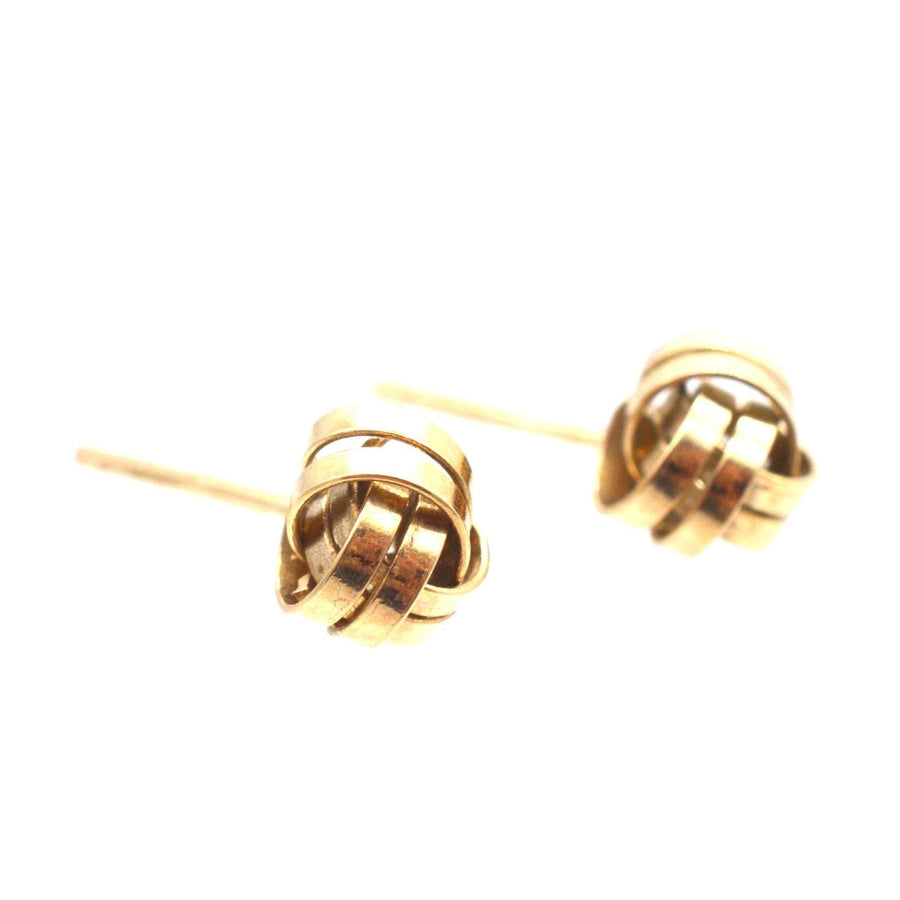 Vintage 9ct gold knot stud earrings from the 1970s-1980s, perfect for day or evening wear.