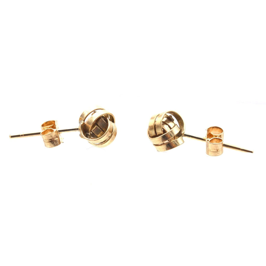 Vintage 9ct gold knot stud earrings, elegantly dainty, perfect for day or evening wear, 1970s-1980s style.