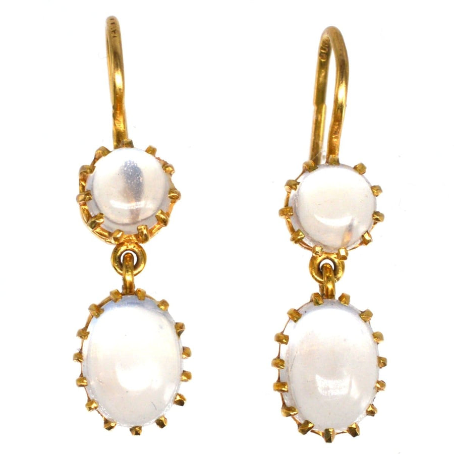 Vintage 9ct gold moonstone drop earrings with round and oval stones showcasing grey/blue flashes.