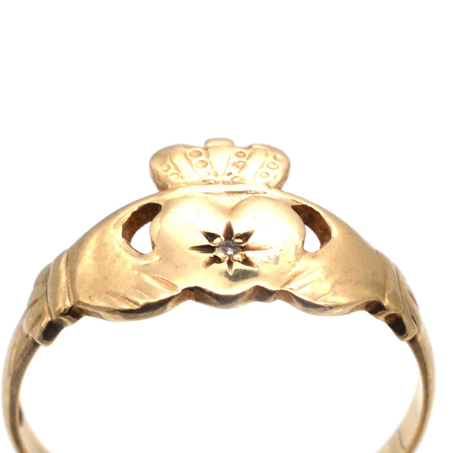 Vintage 9ct Irish Claddagh ring with diamond, symbolizing love, loyalty, and friendship.